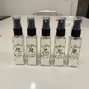 The perfume_bottles on a table (1).webp